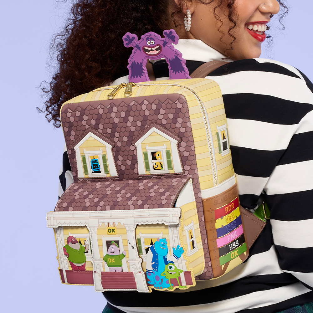 Purple background with model holding Monsters University Loungefly backpack
