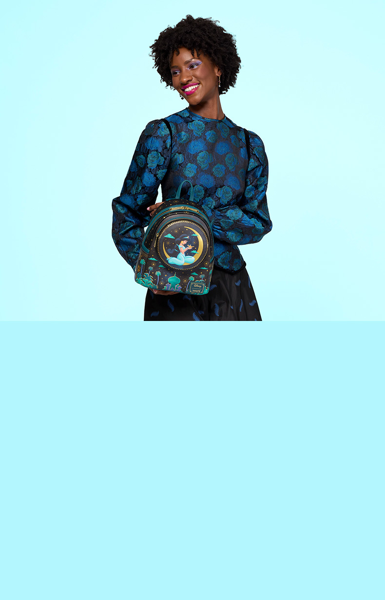 light blue background with model holding Aladdin backpack