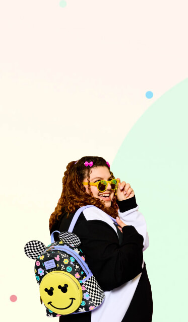 Model wearing Loungefly Disney Mickey Mouse Y2K Mini Backpack